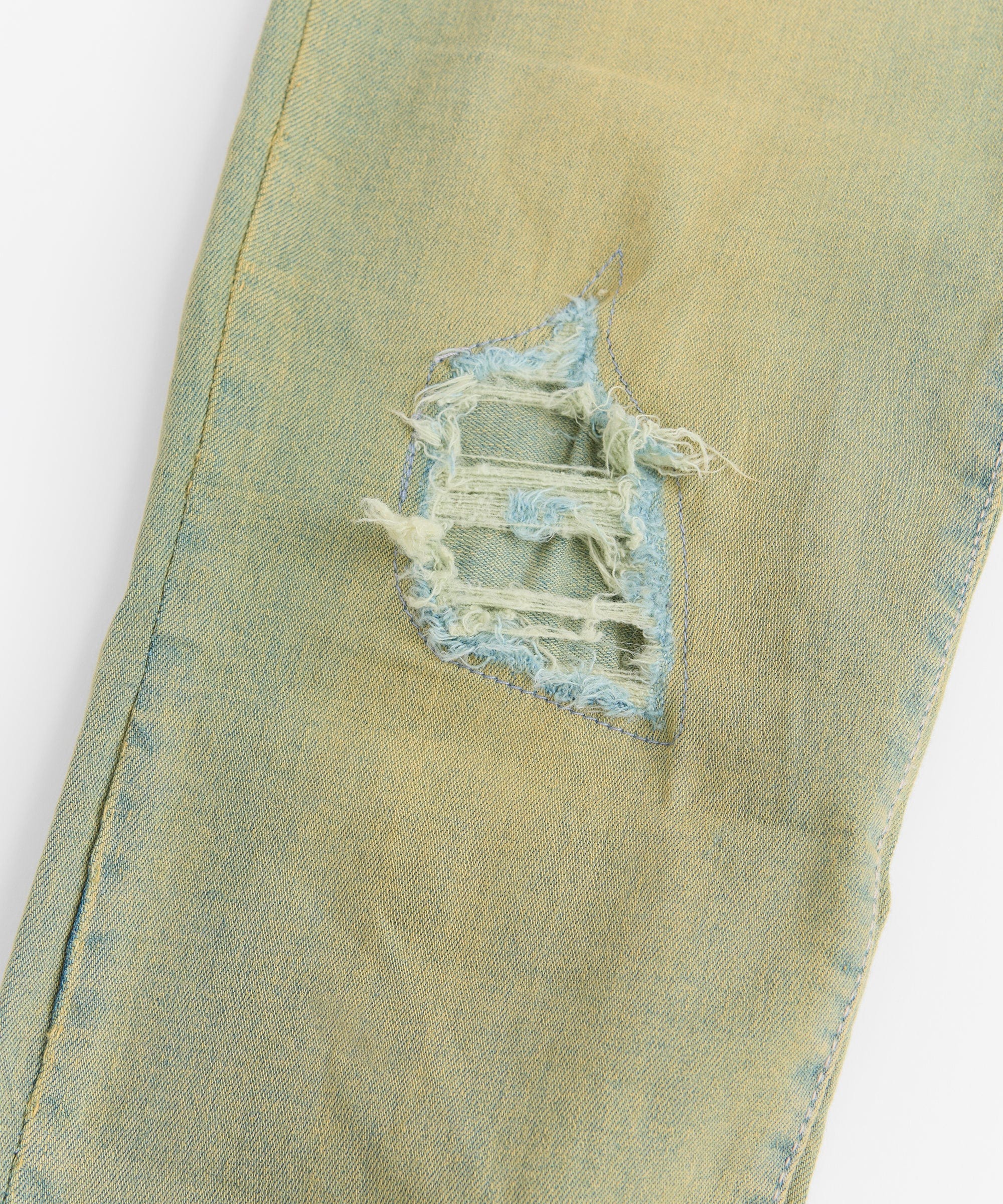 Ripped And Repaired Denim Pants - Vintage Blue